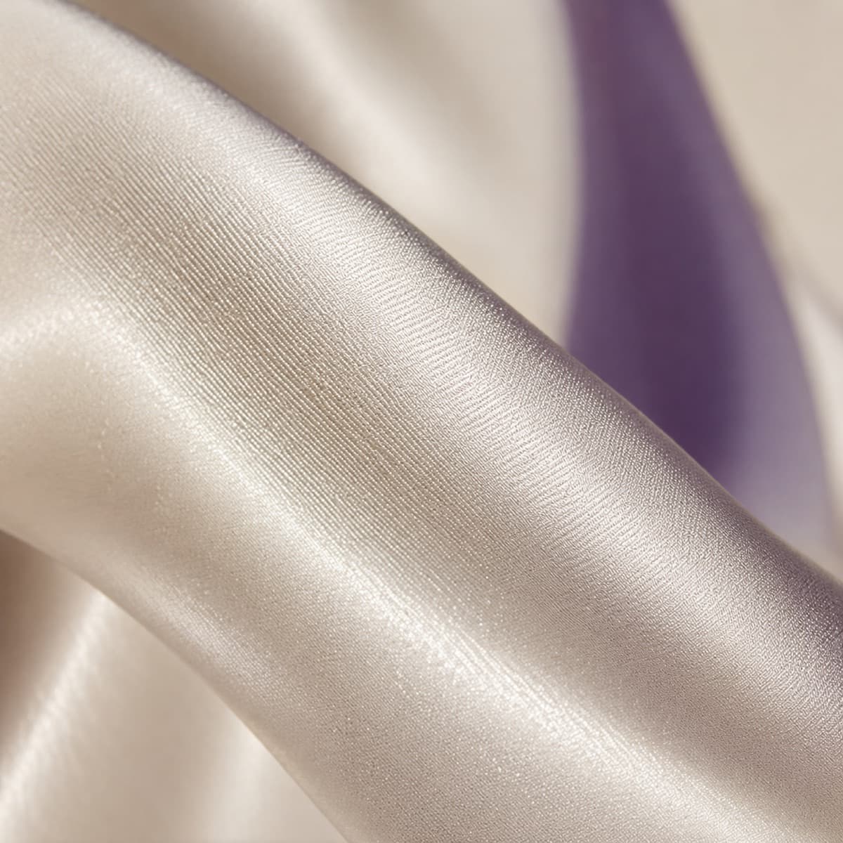 Macro photograph of satin weave catching directional light