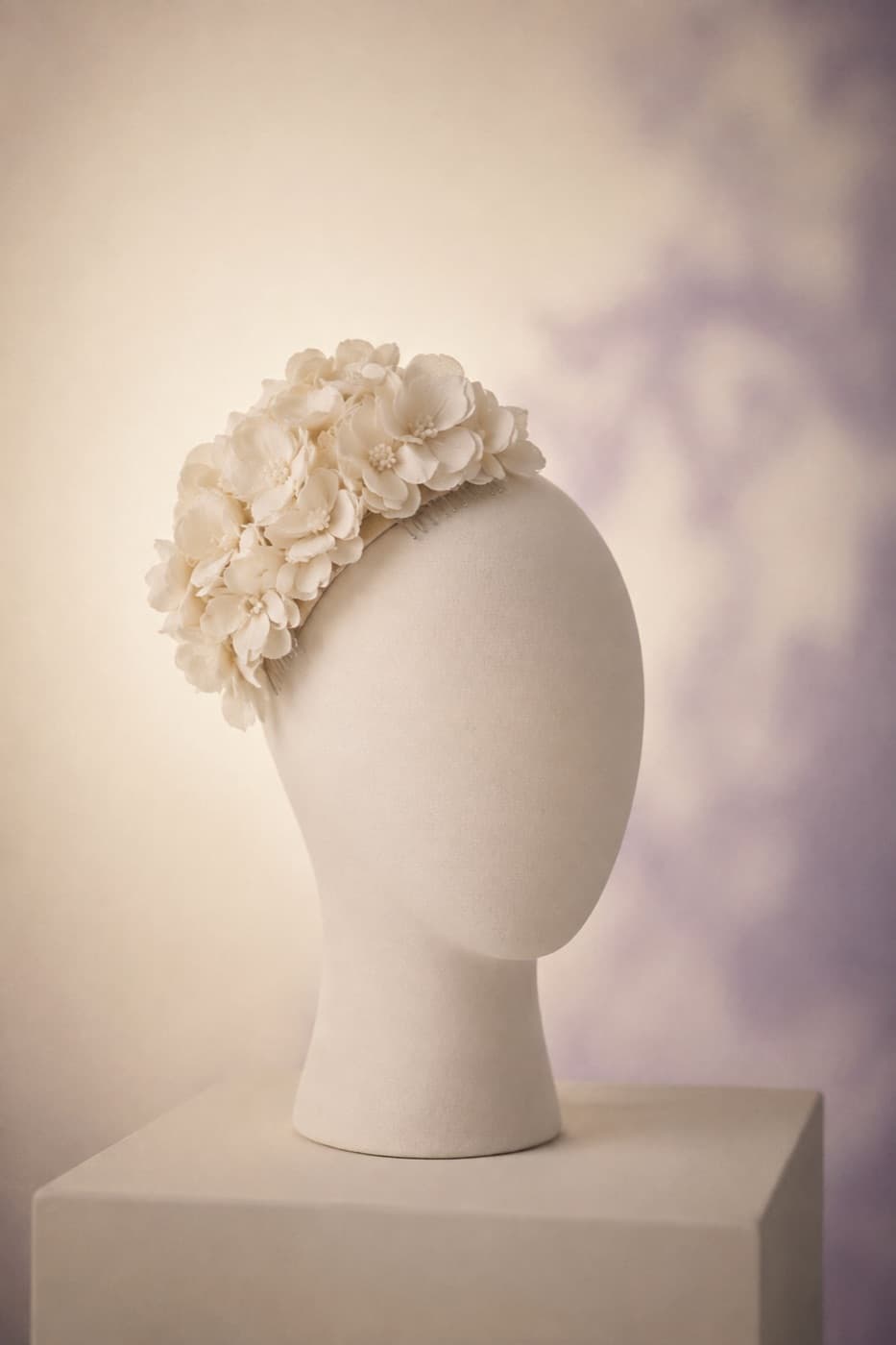 Fascinator Floral photographed whole against an ivory ground